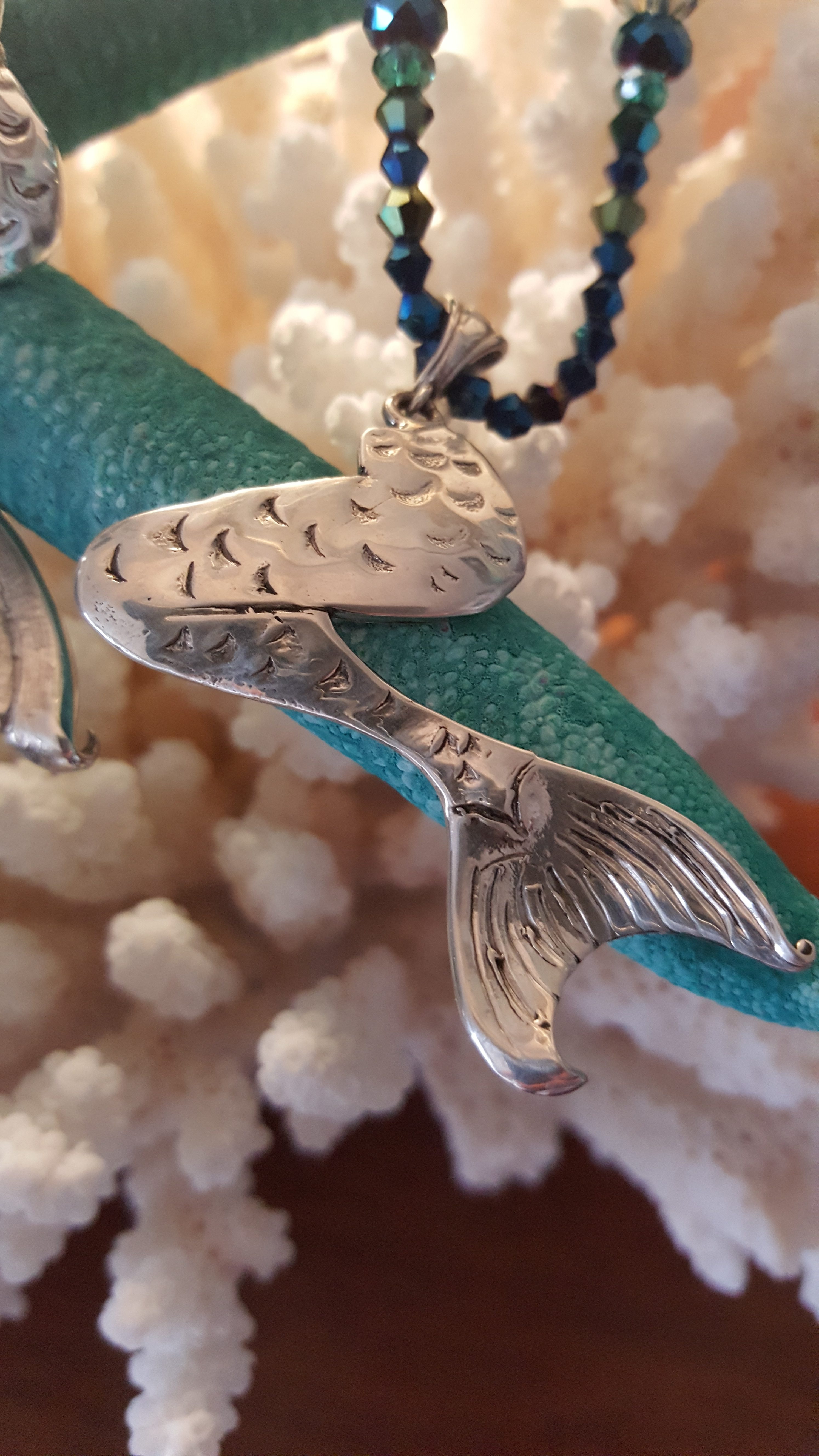 Lovely sterling silver mermaid tail pendant designed by Noel